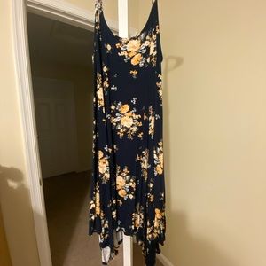 Dark blue asymmetrical midi dress with yellow roses.